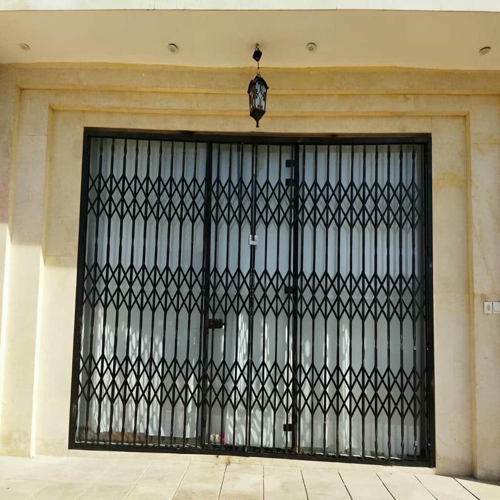 قیمت درب آکاردئونی هماهنگ درب ضدسرقت فلزی در فشم