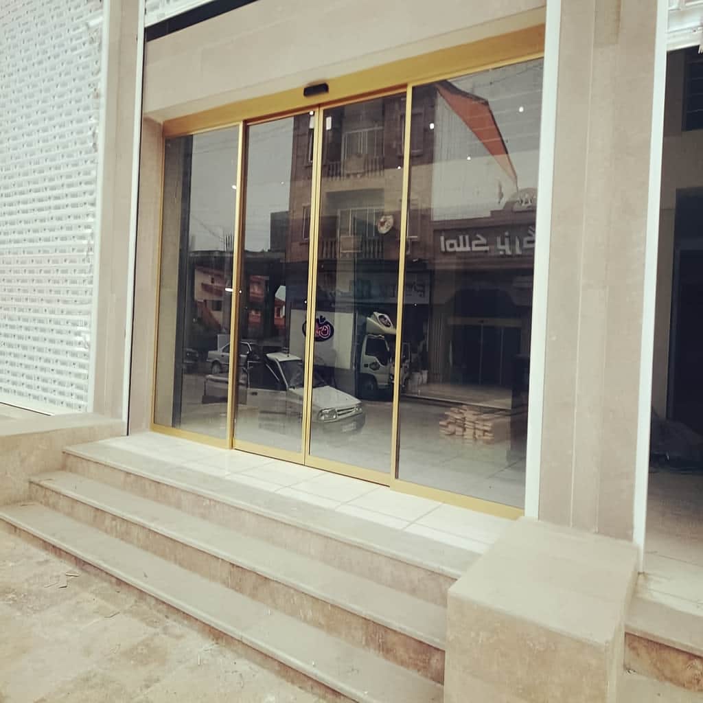 ساخت درب شیشه ای کشویی با باتری پشتیبان
