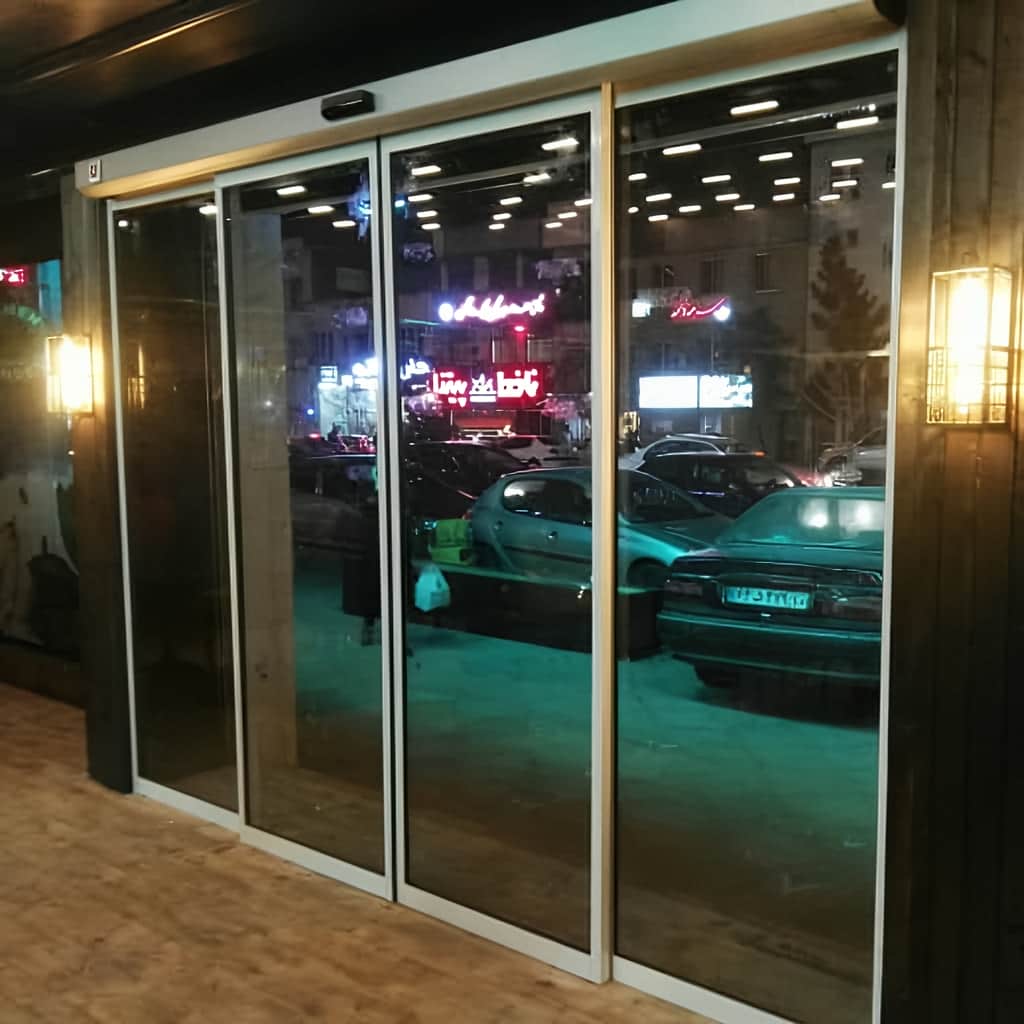 نصب درب اتوماتیک شیشه ای فریم لس با فتوسل ایمنی