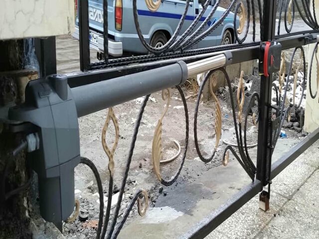 جک درب پارکینگ بازویی در ایلام برای ورودی دو لنگه مرکز فروش و سفارش جک درب پارکینگ در ایلام و حومه